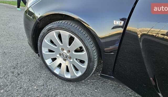 Чорний Опель Інсігнія, об'ємом двигуна 2 л та пробігом 182 тис. км за 7800 $, фото 13 на Automoto.ua