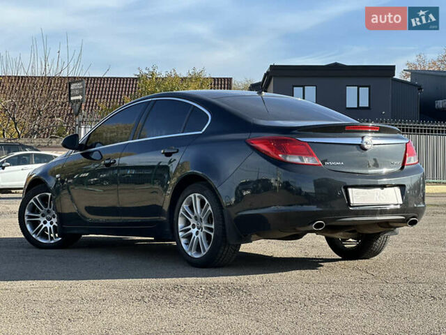 Черный Опель Инсигния, объемом двигателя 2 л и пробегом 263 тыс. км за 8500 $, фото 3 на Automoto.ua