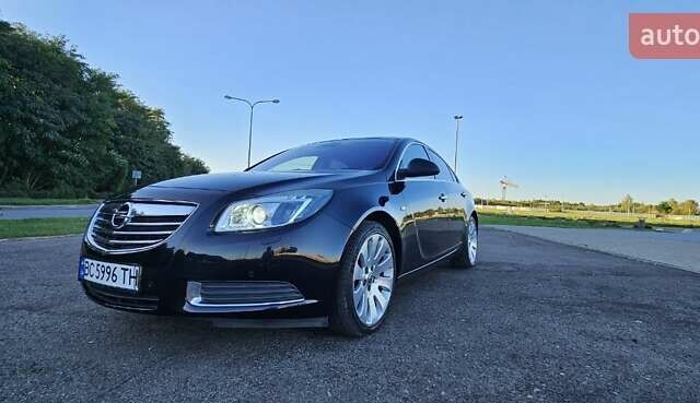 Чорний Опель Інсігнія, об'ємом двигуна 2 л та пробігом 182 тис. км за 8300 $, фото 2 на Automoto.ua