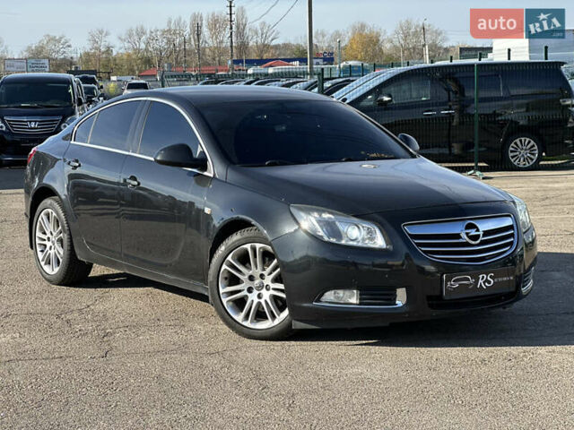 Черный Опель Инсигния, объемом двигателя 2 л и пробегом 263 тыс. км за 8500 $, фото 1 на Automoto.ua