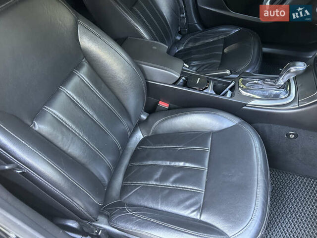 Чорний Опель Інсігнія, об'ємом двигуна 2 л та пробігом 263 тис. км за 7900 $, фото 12 на Automoto.ua