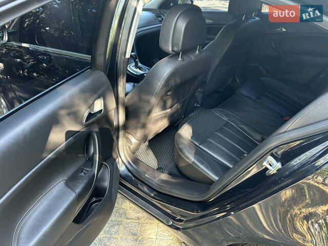 Чорний Опель Інсігнія, об'ємом двигуна 2 л та пробігом 263 тис. км за 7900 $, фото 8 на Automoto.ua