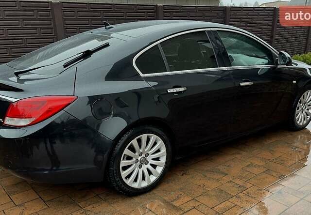 Черный Опель Инсигния, объемом двигателя 1.96 л и пробегом 217 тыс. км за 7777 $, фото 52 на Automoto.ua