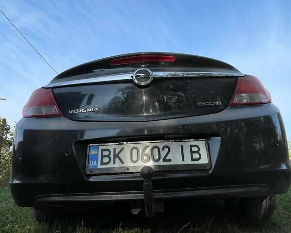 Черный Опель Инсигния, объемом двигателя 2 л и пробегом 290 тыс. км за 7400 $, фото 2 на Automoto.ua