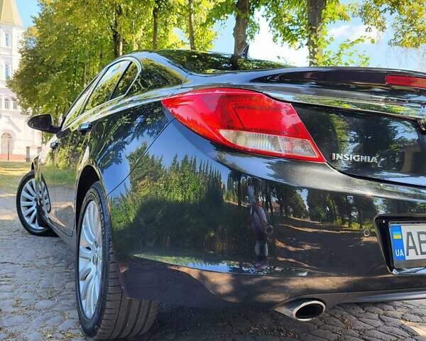 Черный Опель Инсигния, объемом двигателя 2 л и пробегом 240 тыс. км за 9700 $, фото 5 на Automoto.ua