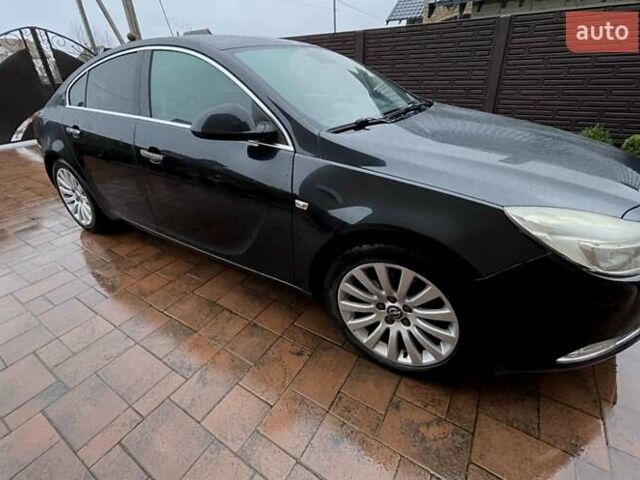 Черный Опель Инсигния, объемом двигателя 1.96 л и пробегом 217 тыс. км за 7777 $, фото 1 на Automoto.ua