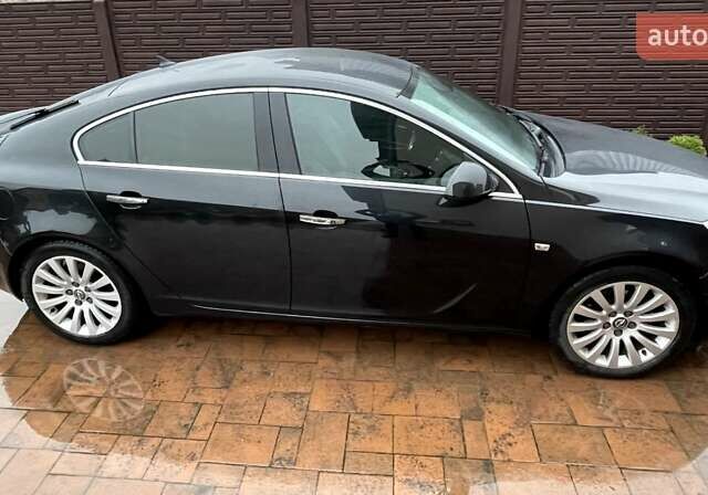 Черный Опель Инсигния, объемом двигателя 1.96 л и пробегом 217 тыс. км за 7777 $, фото 6 на Automoto.ua