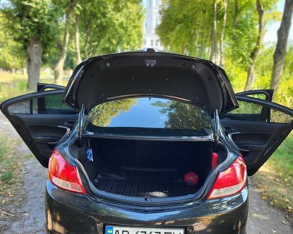 Черный Опель Инсигния, объемом двигателя 2 л и пробегом 240 тыс. км за 9700 $, фото 4 на Automoto.ua