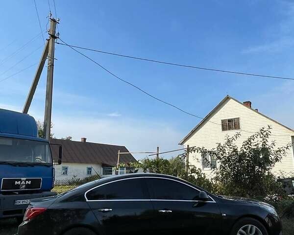 Черный Опель Инсигния, объемом двигателя 2 л и пробегом 290 тыс. км за 7400 $, фото 1 на Automoto.ua