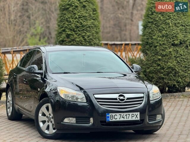 Чорний Опель Інсігнія, об'ємом двигуна 2 л та пробігом 297 тис. км за 7000 $, фото 7 на Automoto.ua