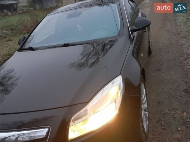 Черный Опель Инсигния, объемом двигателя 1.96 л и пробегом 253 тыс. км за 5500 $, фото 1 на Automoto.ua