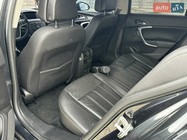 Черный Опель Инсигния, объемом двигателя 2 л и пробегом 310 тыс. км за 7700 $, фото 8 на Automoto.ua