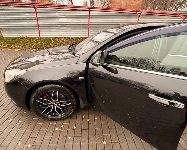 Черный Опель Инсигния, объемом двигателя 2 л и пробегом 209 тыс. км за 8200 $, фото 7 на Automoto.ua