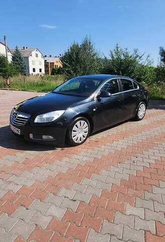 Черный Опель Инсигния, объемом двигателя 1.96 л и пробегом 270 тыс. км за 8950 $, фото 2 на Automoto.ua