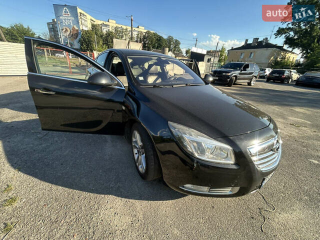 Чорний Опель Інсігнія, об'ємом двигуна 2 л та пробігом 280 тис. км за 6350 $, фото 1 на Automoto.ua