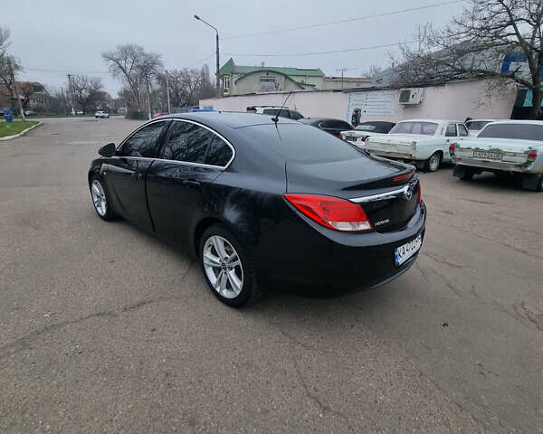 Черный Опель Инсигния, объемом двигателя 1.4 л и пробегом 205 тыс. км за 8000 $, фото 1 на Automoto.ua