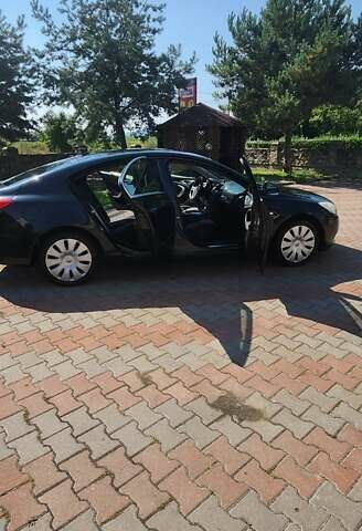 Черный Опель Инсигния, объемом двигателя 1.96 л и пробегом 270 тыс. км за 8950 $, фото 4 на Automoto.ua