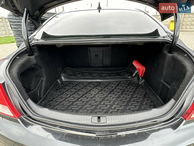 Черный Опель Инсигния, объемом двигателя 2 л и пробегом 310 тыс. км за 7700 $, фото 9 на Automoto.ua