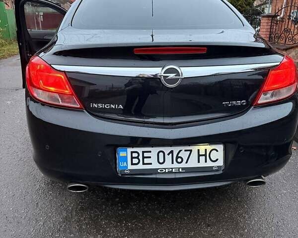 Черный Опель Инсигния, объемом двигателя 2 л и пробегом 209 тыс. км за 8200 $, фото 3 на Automoto.ua