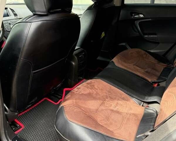 Черный Опель Инсигния, объемом двигателя 2 л и пробегом 255 тыс. км за 7300 $, фото 2 на Automoto.ua