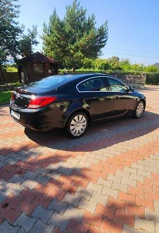 Черный Опель Инсигния, объемом двигателя 1.96 л и пробегом 270 тыс. км за 8950 $, фото 1 на Automoto.ua