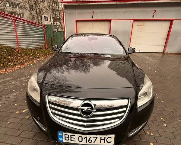Черный Опель Инсигния, объемом двигателя 2 л и пробегом 209 тыс. км за 8200 $, фото 1 на Automoto.ua