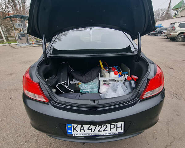 Черный Опель Инсигния, объемом двигателя 1.4 л и пробегом 205 тыс. км за 8000 $, фото 11 на Automoto.ua