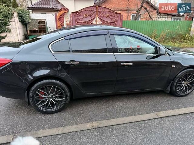 Черный Опель Инсигния, объемом двигателя 2 л и пробегом 209 тыс. км за 8200 $, фото 2 на Automoto.ua