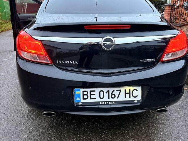 Чорний Опель Інсігнія, об'ємом двигуна 2 л та пробігом 209 тис. км за 7500 $, фото 4 на Automoto.ua