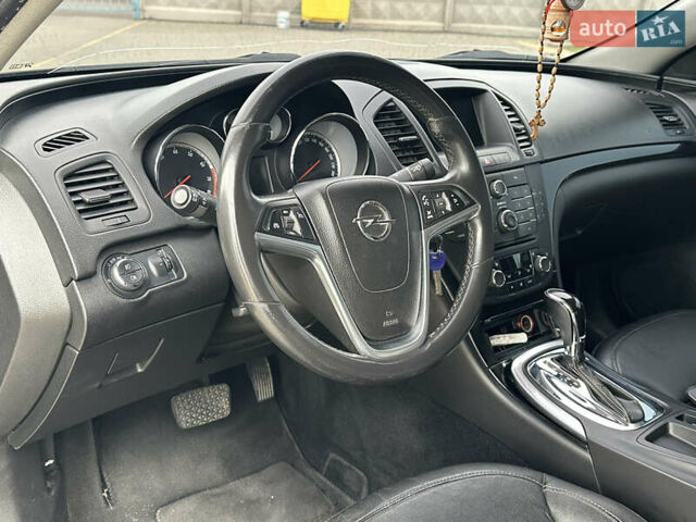 Черный Опель Инсигния, объемом двигателя 2 л и пробегом 310 тыс. км за 7700 $, фото 6 на Automoto.ua