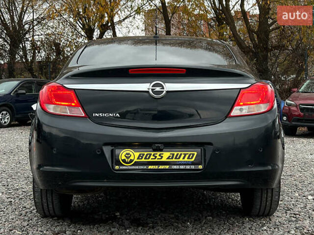 Чорний Опель Інсігнія, об'ємом двигуна 1.36 л та пробігом 161 тис. км за 8750 $, фото 4 на Automoto.ua