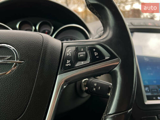 Чорний Опель Інсігнія, об'ємом двигуна 1.36 л та пробігом 161 тис. км за 8750 $, фото 9 на Automoto.ua