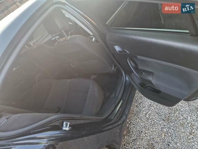Чорний Опель Інсігнія, об'ємом двигуна 1.96 л та пробігом 340 тис. км за 6500 $, фото 7 на Automoto.ua