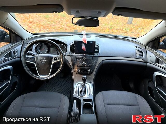 Черный Опель Инсигния, объемом двигателя 2 л и пробегом 246 тыс. км за 9999 $, фото 6 на Automoto.ua