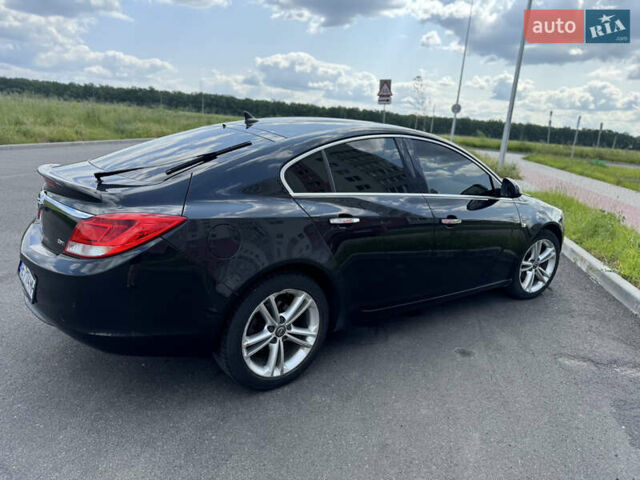 Черный Опель Инсигния, объемом двигателя 1.96 л и пробегом 285 тыс. км за 6500 $, фото 1 на Automoto.ua