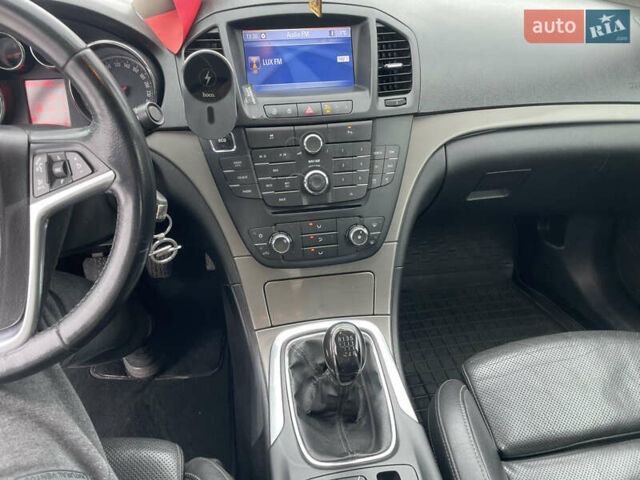 Черный Опель Инсигния, объемом двигателя 1.96 л и пробегом 344 тыс. км за 7500 $, фото 7 на Automoto.ua