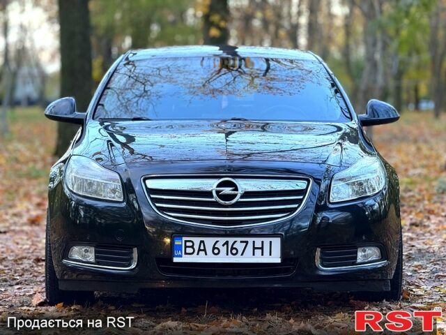 Черный Опель Инсигния, объемом двигателя 2 л и пробегом 246 тыс. км за 9999 $, фото 1 на Automoto.ua