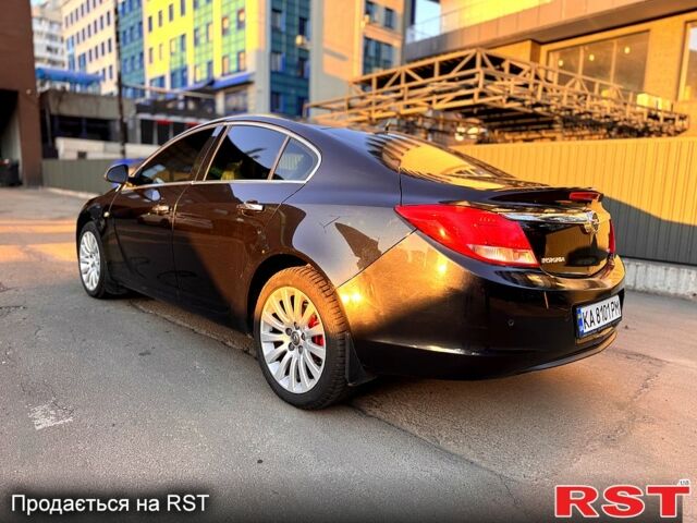 Черный Опель Инсигния, объемом двигателя 2 л и пробегом 217 тыс. км за 8500 $, фото 4 на Automoto.ua