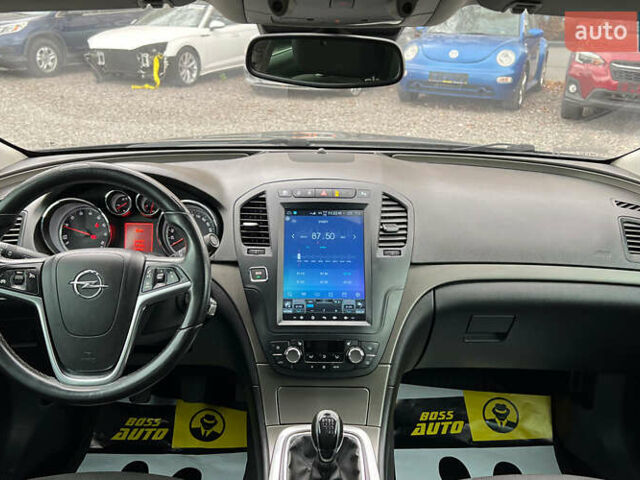 Чорний Опель Інсігнія, об'ємом двигуна 1.36 л та пробігом 161 тис. км за 8750 $, фото 10 на Automoto.ua