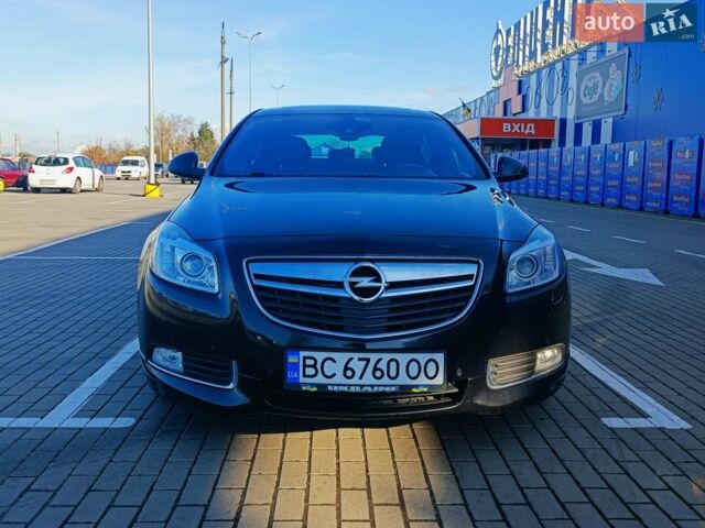 Черный Опель Инсигния, объемом двигателя 2 л и пробегом 253 тыс. км за 10400 $, фото 1 на Automoto.ua