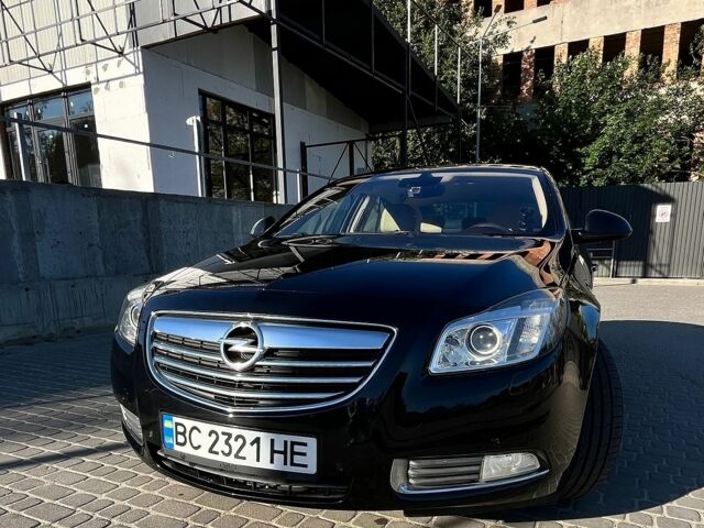 Черный Опель Инсигния, объемом двигателя 2 л и пробегом 304 тыс. км за 7500 $, фото 3 на Automoto.ua