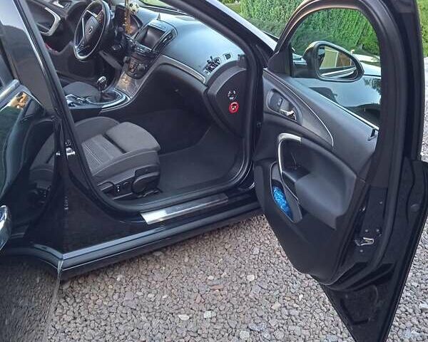 Черный Опель Инсигния, объемом двигателя 2 л и пробегом 200 тыс. км за 9962 $, фото 5 на Automoto.ua