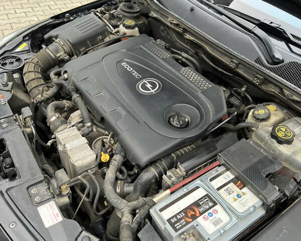 Чорний Опель Інсігнія, об'ємом двигуна 1.96 л та пробігом 308 тис. км за 11500 $, фото 5 на Automoto.ua