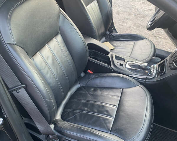 Чорний Опель Інсігнія, об'ємом двигуна 1.6 л та пробігом 245 тис. км за 10500 $, фото 3 на Automoto.ua