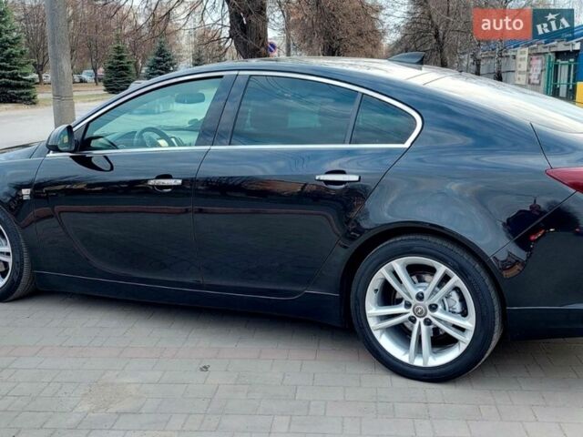 Чорний Опель Інсігнія, об'ємом двигуна 1.96 л та пробігом 191 тис. км за 13700 $, фото 2 на Automoto.ua