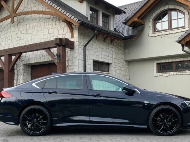 Черный Опель Инсигния, объемом двигателя 2 л и пробегом 78 тыс. км за 11500 $, фото 4 на Automoto.ua