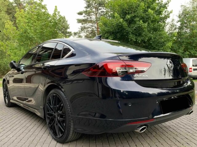 Черный Опель Инсигния, объемом двигателя 2 л и пробегом 78 тыс. км за 11500 $, фото 5 на Automoto.ua