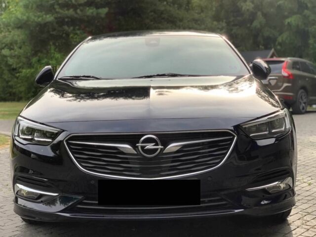 Черный Опель Инсигния, объемом двигателя 2 л и пробегом 78 тыс. км за 11500 $, фото 1 на Automoto.ua