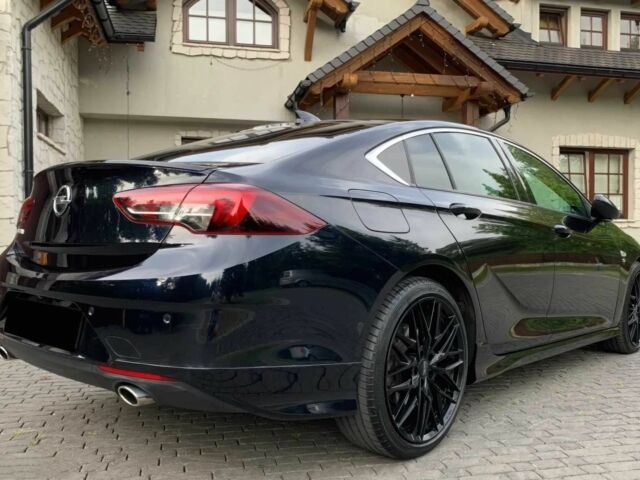 Черный Опель Инсигния, объемом двигателя 2 л и пробегом 78 тыс. км за 11500 $, фото 6 на Automoto.ua