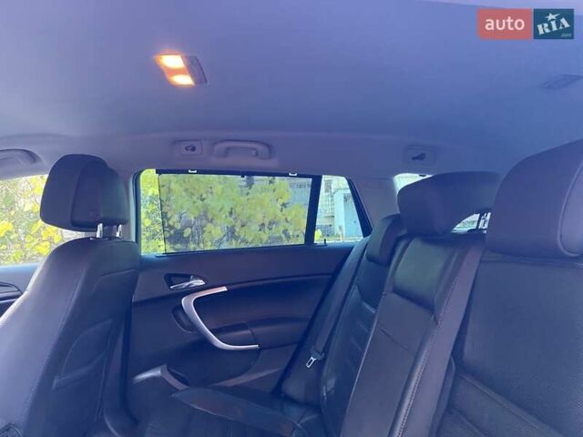 Черный Опель Инсигния, объемом двигателя 1.96 л и пробегом 208 тыс. км за 7750 $, фото 43 на Automoto.ua